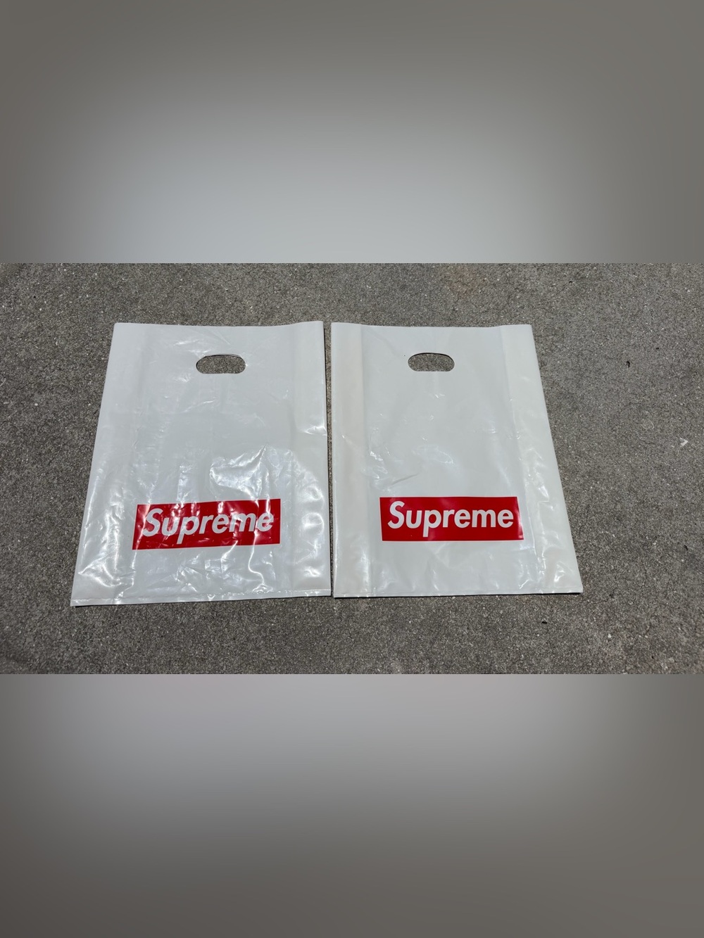 2 Supreme Shopping Bags 13” W x 16” L